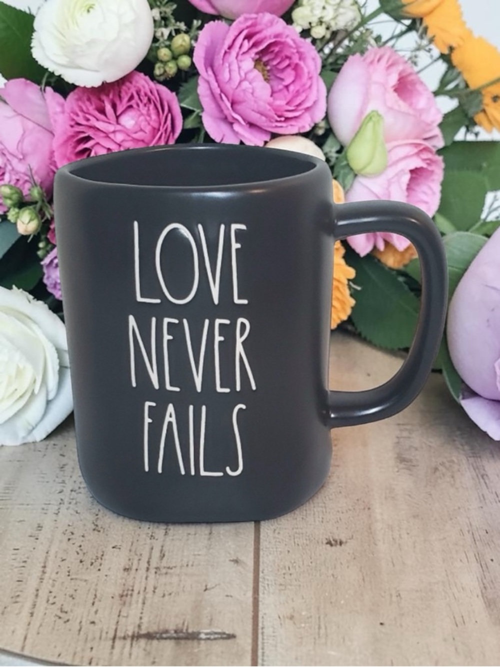 Rae Dunn Matte Black 'Love Never Fails' Ceramic Coffee Mug
